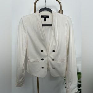 White blazer with silver buttons